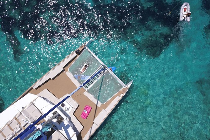 Blue Lagoon, Beaches and Bays Catamaran Sailing Tour - Boat Comfort Rules: Sunbeds, Nets, Slide, and Shoe-Free Decks