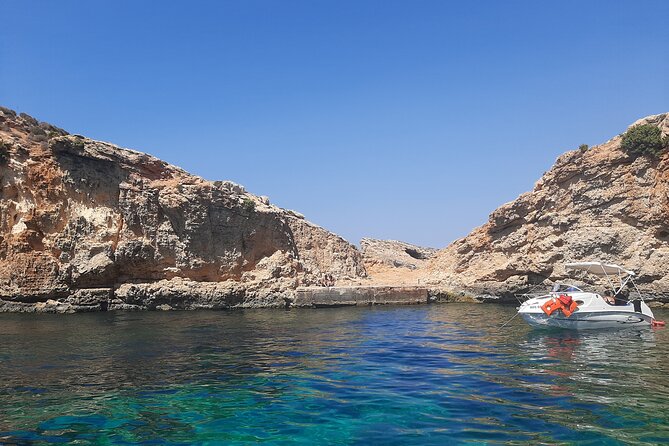 Boat Charters Blue lagoon, Crystal Lagoon, Comino, Malta 4hr trip - Passing St Mary’s tower and Elephant Head Rock: film-meets-sea sightseeing