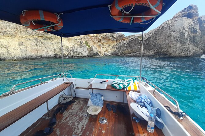 Boat Charters Blue lagoon, Crystal Lagoon, Comino, Malta 4hr trip - San Niklaw Bay: the calm finish with crystal-clear water