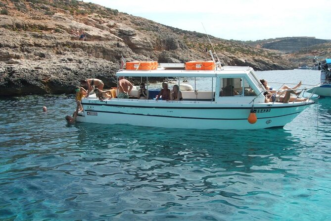 Comino and Gozo Private Boat Tour : Julie Pearl Boat - Cruising Gozo’s south coast: beaches, bays, and Bemberin gorge