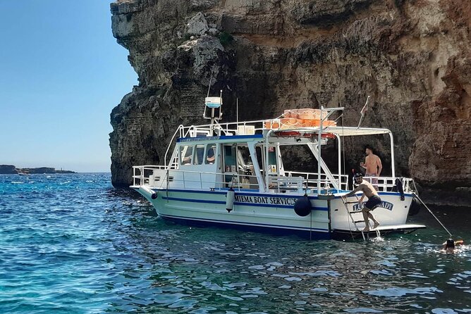 Comino Blue Lagoon and Gozo Private Boat Charter: Lucky Lady Boat - Stop 1 on Comino: Blue Lagoon swim time where anchoring matters