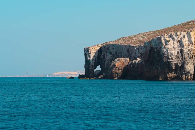 Comino: Blue Lagoon, Crystal Lagoon and Sea Caves Boat Tour - Santa Maria Bay and the Caves: Where the Small Boat Pays Off