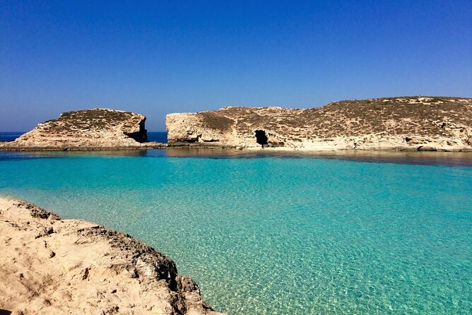 Comino Private Boat Tour in Malta - Stop 1: Blue Lagoon swimming in a natural pool