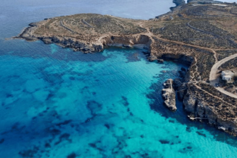 From Gozo:Around Comino, Blue Lagoon, Crystal Lagoon & Caves - Crystal Lagoon and the snorkeling option you can actually plan for