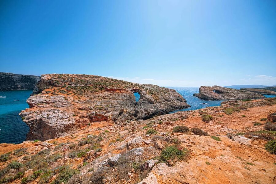From Mellieha: Three Bay Cruise including the Blue Lagoon - Ħalfa Rock Bay on Gozo: the pebbly shore that often feels calmer