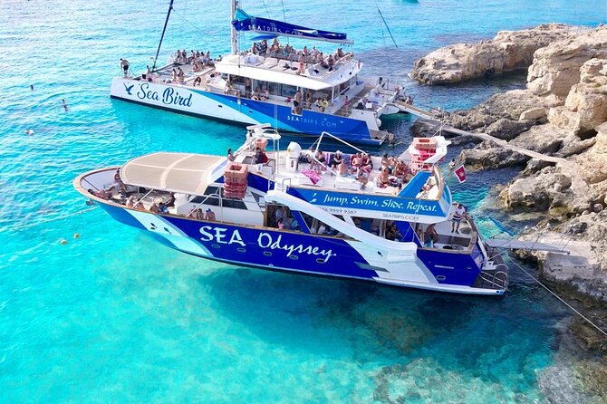 Gozo & Comino Islands, Blue Lagoon & Seacaves Tour - Blue Lagoon swim stop: slides, ladders, and the free entry pass