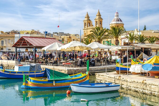 Half Day Tour in Marsaxlokk Village, Market, Blue Grotto & Qrendi - The Marsaxlokk Sunday open market: where you can snack and browse like locals