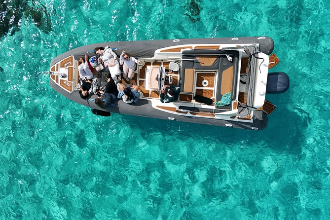 Luxury RIB Tour in Gozo Coast, Blue Lagoon and Comino Caves - Cominotto Reef and Cominotto Island: reefs, tunnels, and cliff views
