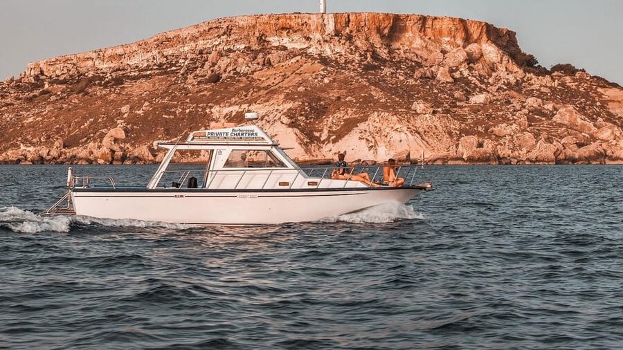 Malta: Blue lagoon, Gozo, Comino & Crystal Lagoon Sea Caves - Mgarr Harbour cruise-by: a quick photo stop with port energy