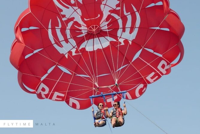 MALTA - Go & Fun Parasailing Free Photos & Videos - Getting Strapped In: Harnesses, Life Vests, and the Team’s Style