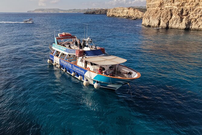 Malta: Gozo, Comino, Blue lagoon Tour with Cave Trips - Scenic Pass-By Stops: Elephant Rock and San Nicholas Bay Views