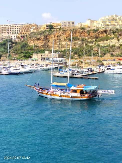 Malta: Gozo, Comino Island and Blue Lagoon Cruise - Cruise Along Malta’s Coast: St. Paul’s Island, Mellieha Bay, and Cave Pass-By