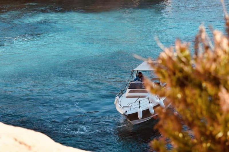Malta: Private Boat Cruise with Caves, Beaches & Swim Stops - Blue Lagoon: why the water looks famous, and the QR code rule