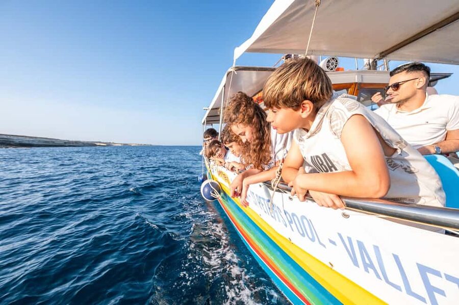 Malta: Sunset Boat Tour to St. Peter’s Pool and South Coast - Guiding style: friendly crew, English audio support, and what to watch for