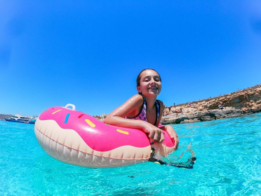 Malta: Sunset Cruise to the Blue Lagoon - Comino at sunset: walk the beach or stay in your lounge chair