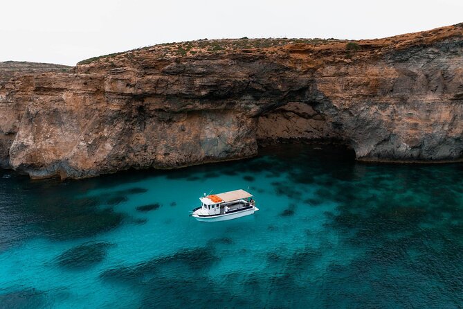Mellieha: Gozo, Comino, Sea Caves, and Blue Lagoon Cruise - Crystal Lagoon Caves: turquoise water with real cave access