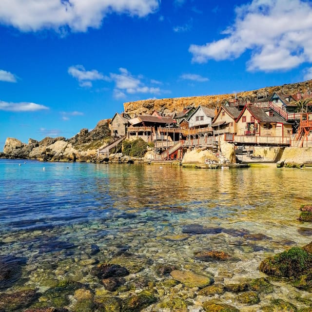 Mellieha: Popeye Village Malta Filmset Entry Ticket - Summer at Anchor Bay: inflatables, splash pools, and included loungers