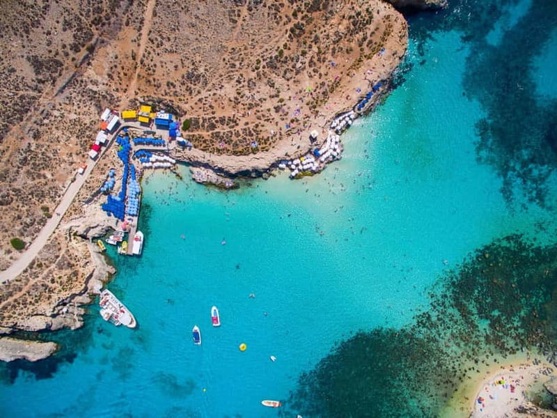 Mellieha: Round Comino, Blue Lagoon & Gozo Cruise with Water - Blue Lagoon swim break plus the May 2025 access pass