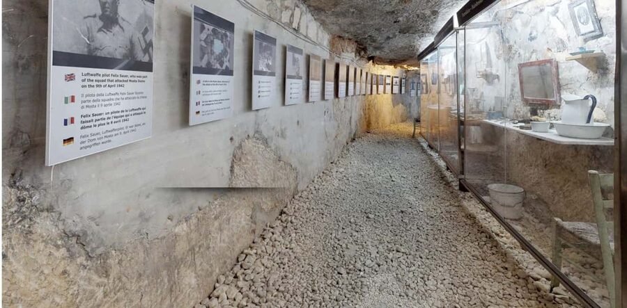 Mosta: Official Rotunda, WWII Shelter, and Buffet Meal Tour - Walking the old streets with a team member guide