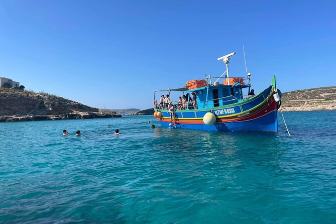 Private Boat charter to Crystal & Blue Lagoon, Caves & Comino - Blue Lagoon: swim time, snacks, and a Comino tower hike option