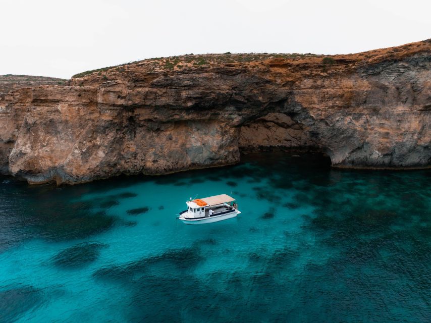 Private Boat Tour Experience with Blue Lagoon and Comino - Food, drinks, and the sunset finish