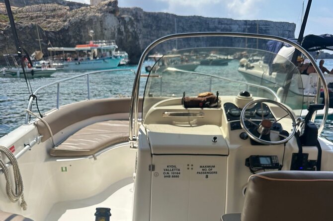 Private Boat Tour Malta: Blue Lagoon, Comino, Gozo, & Sea Caves - Comino Caves and Santa Marija Tower: where the photos come from