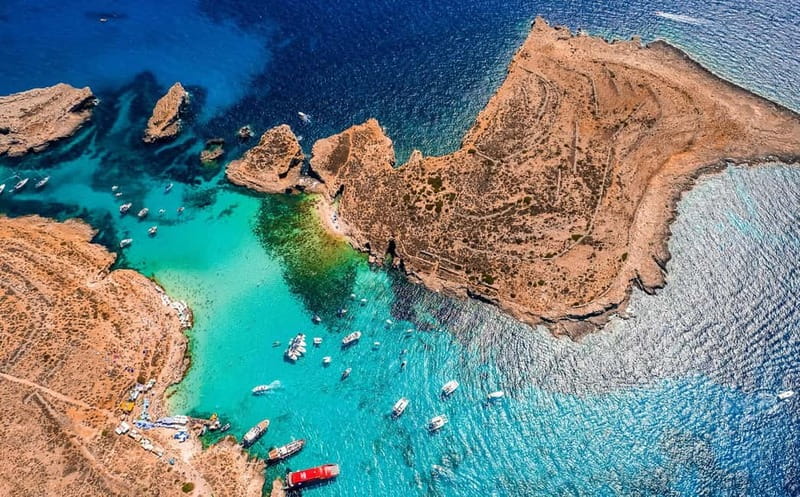 Sliema: Comino, Crystal Lagoon & Blue Lagoon Cruise w/ Lunch - Lunch onboard: a real sit-down break at sea