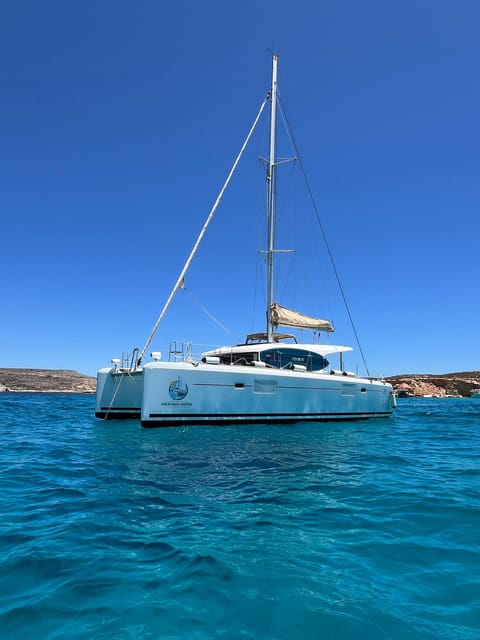 St. Paul's Bay: Half-Day Scenic Catamaran Tour with Drinks - Santa Maria Caves: Short Stop, Great Photo Angles From the Water